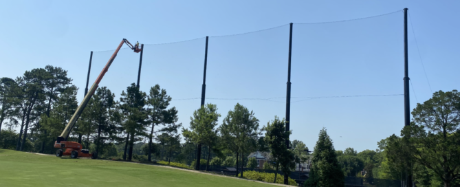 Installation of 200'L x 75'H netting system using aerial lift equipment at Carmel Country Club Driving Range